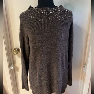 Large sweater with beads on neck